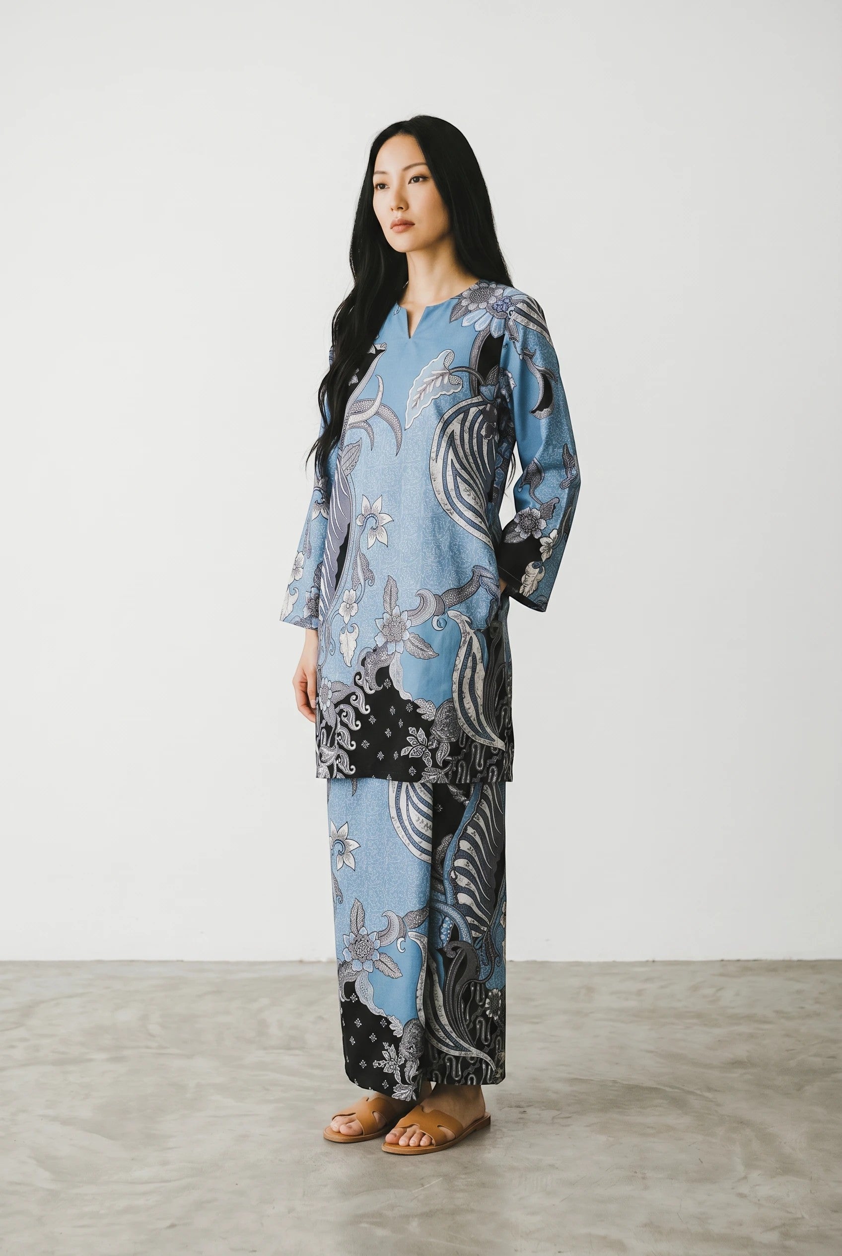 PARCA Nazima blue cotton top and maxi sarung set with traditional batik-inspired floral patterns on a model
